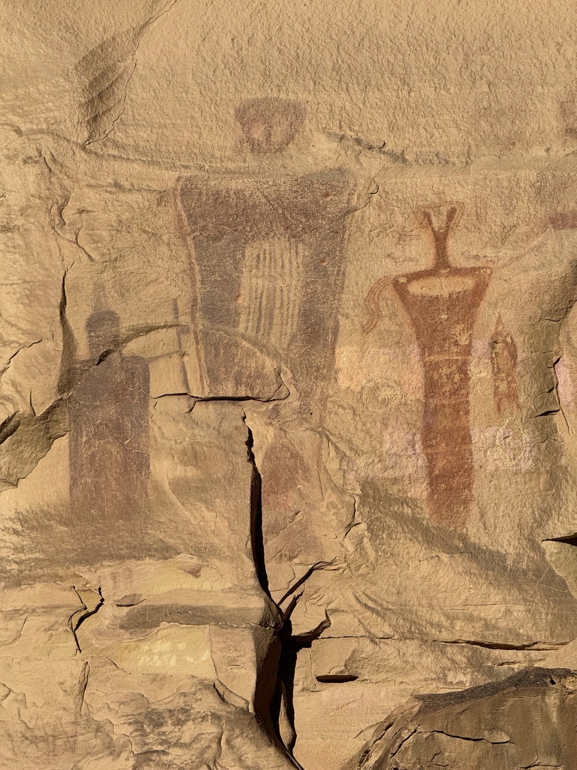 Close view of a tall painted figure